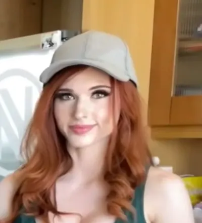 Amouranth wearing a baseball cap in 2022